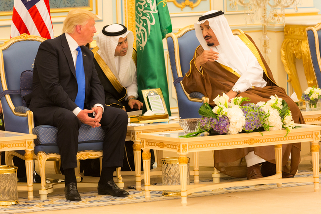 Donald Trump and King Salman bin Abdulaziz Al Saud talk together May 2017 wikipedia commons