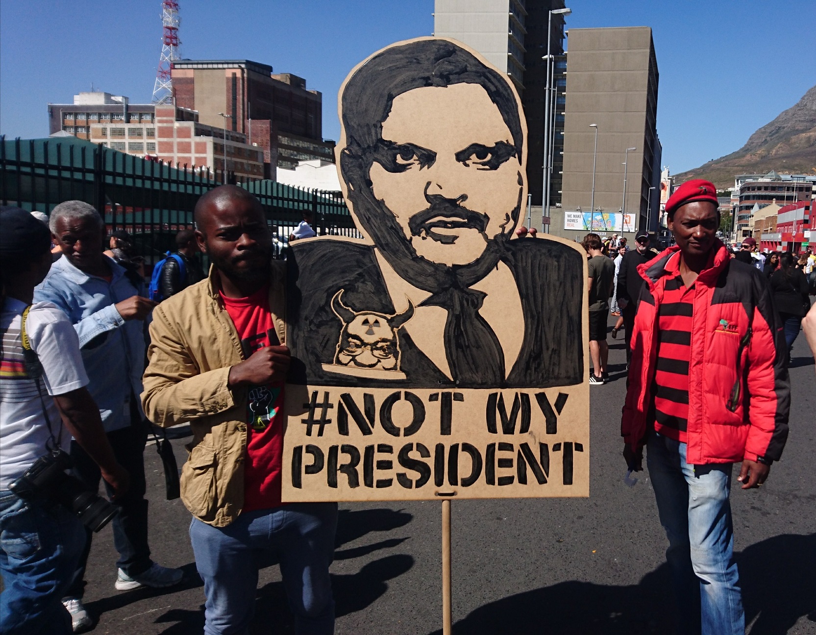 Atul Gupta protest banner Cape Town Zuma must fall