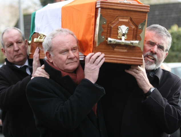 Bobby Storey Martin McGuinness and Gerry Adams carry Harry Thompson Sinn Fein flickr.com photos sinnfeinireland