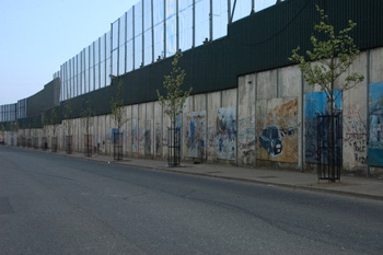 The so-called 'Peace Wall' separates Protestants and Catholics in Belfast. Photo by a11sus on Flickr.