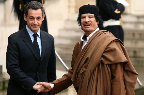 Gaddafi and Sarkozy shaking hands during a summit in 2007, a photo that has subsequently been removed from the president's website. Photo: Présidence de la République